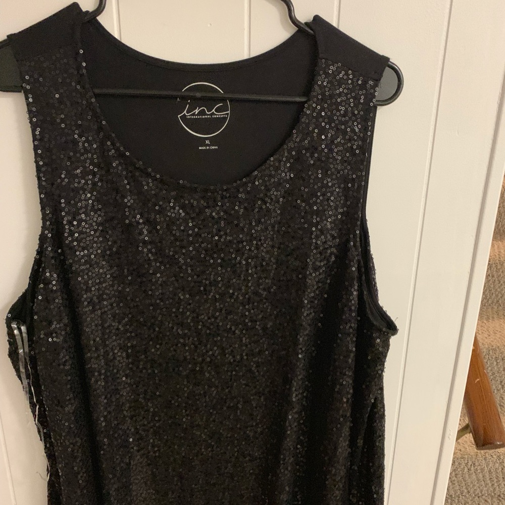 All black sequin top with cut out shoulders